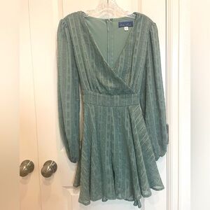 Francesca’s Green Sparkle Bow Back Romper